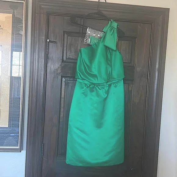 Green satin Cynthia Rowley dress over one shoulder. No tags but never worn. Green satin Cynthia Rowley dress over one shoulder. No tags but never worn.
